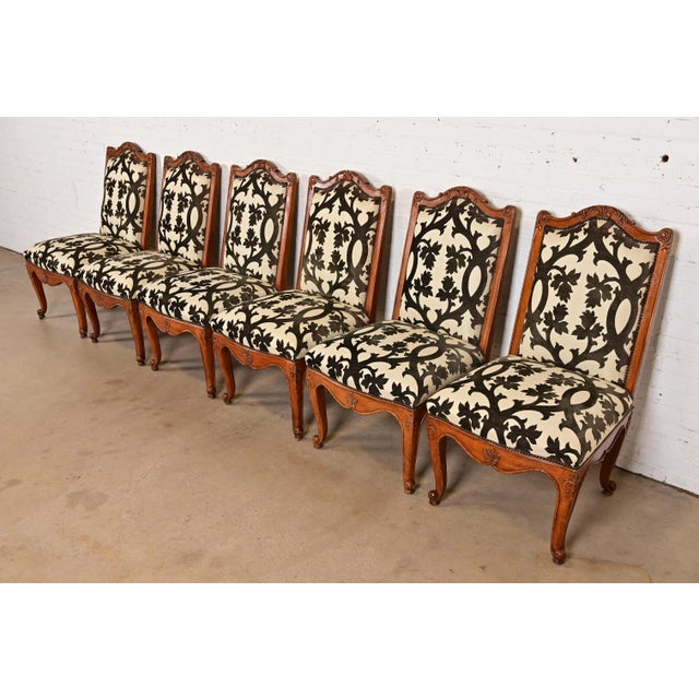 An outstanding set of six French Rococo or French Provincial Louis XV style dining chairs By Baker Furniture USA, Circa...