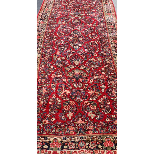 Antique Sarouk Long Gallery Runner With All-Over Flower Design in Red Background For Sale In Atlanta - Image 6 of 12