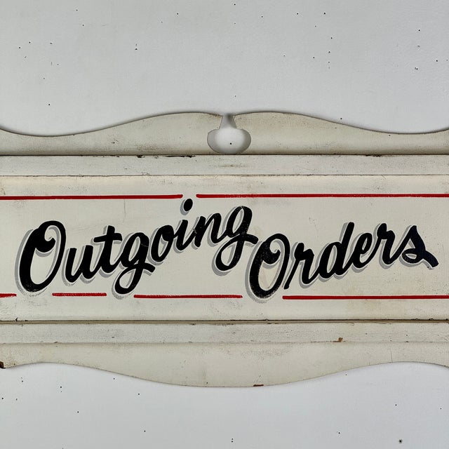 Straight out of a New Jersey diner comes this Mid 20th Century wooden sign. It is hand written and tells you where the...