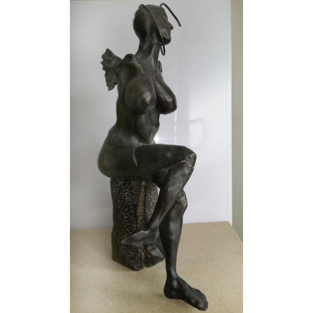 Sirya 2010 bronze 75x35x35 i sculpted this work in bronze to express the fluid strength and mysterious elegance of human...