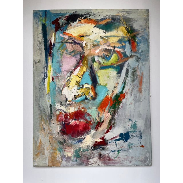 This evocative 36” x 48” oil painting features a haunting abstract interpretation of a human face. Rich textures and...