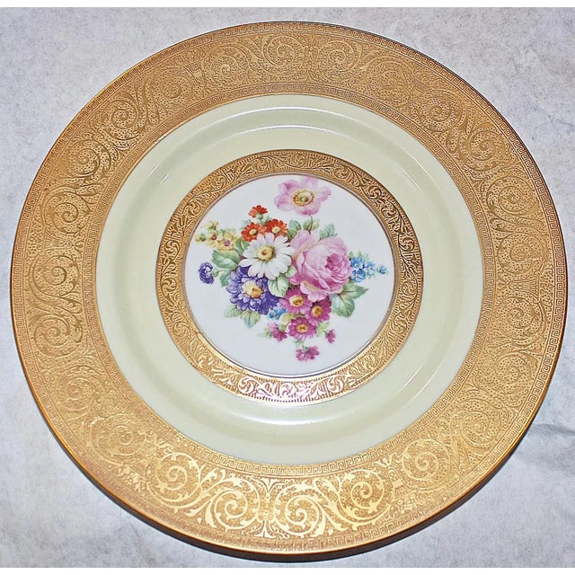 Stun them with this stunning floral-decorated porcelain chargers intricately decorated in 23-karat gold motif. H&C Co. in...