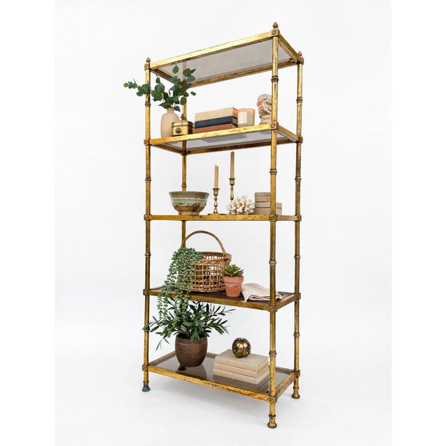 Vintage Italian Gold Gilt Faux Bamboo Étagère – Hollywood Regency Metal Bookcase with Smoked Glass & Cane Shelves Elevate...