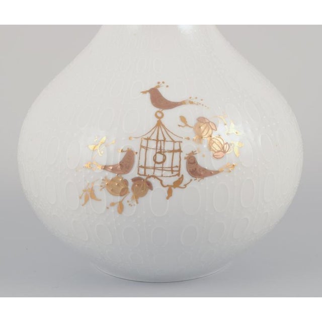 Bjørn Wiinblad for Rosenthal. Narrow-necked vase in porcelain. Decorated with gold motifs. from the "Romanze" series....