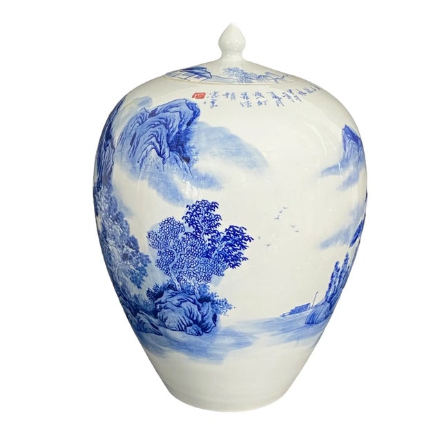 This exquisite ginger jar, hand-painted in stunning blue and white, boasts a graceful shape and superior quality. It...