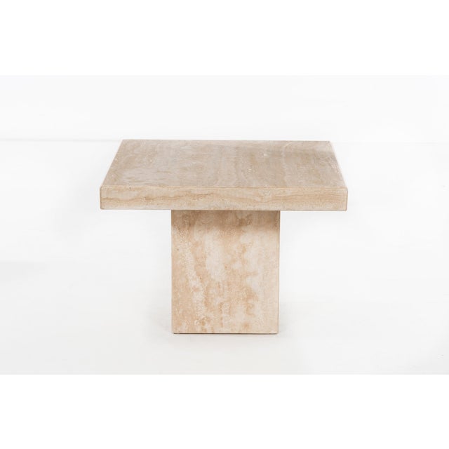 Travertine side table, beveled edge, fully filled and polished. Top securely fits on base and is held gravitationally.