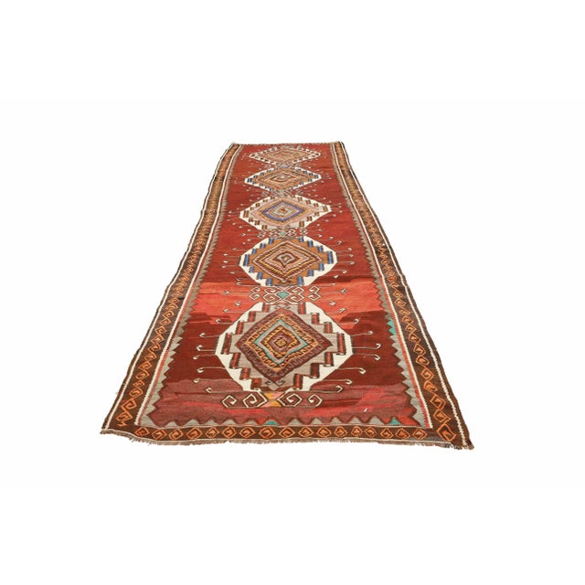 Vintage handwoven decorative kilim rug from Kars region of Turkey. Approximately 50-60 years old. In very good condition.