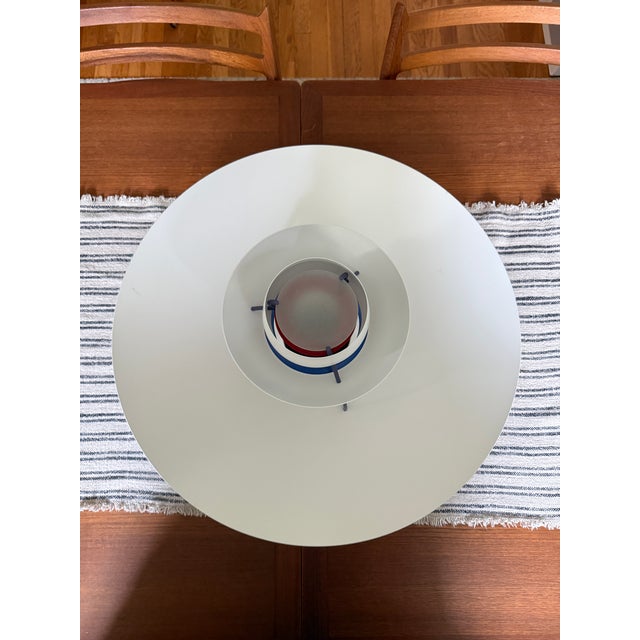 **Louis Poulsen PH 5 Pendant Light — White with Blue & Red** An iconic PH 5 pendant light by Louis Poulsen, designed by...