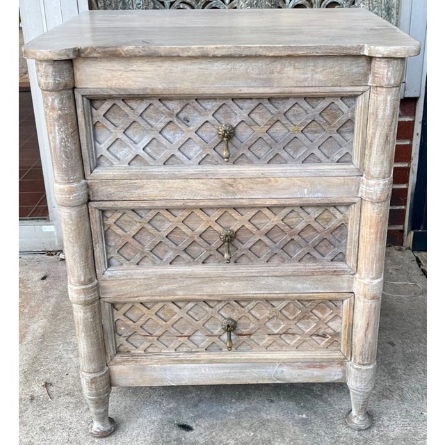 This set of two Old Farmhouse rustic bedside tables features three drawers and is crafted from solid wood with a driftwood...