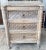 This set of two Old Farmhouse rustic bedside tables features three drawers and is crafted from solid wood with a driftwood...