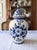 Elegant early 20th-century Dutch Delft Blue lidded vase, authentically made in Holland and hand-painted in the traditional...