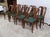 Beautiful set of massive walnut chairs, resting at the front by two square feet with sheath, slightly to the bottom, with...