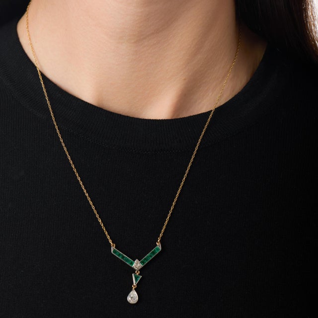 This sophisticated Mid Century necklace is a striking example of 1960s design, defined by clean geometry, artistic...