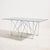 This French dining table was designed by Max Sauze in the 1970s. The table features clean lines, a glass top in black and...
