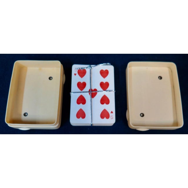 This vintage early 20th century celluloid card box & point counter is wonderfully decorated with sterling silver corner...