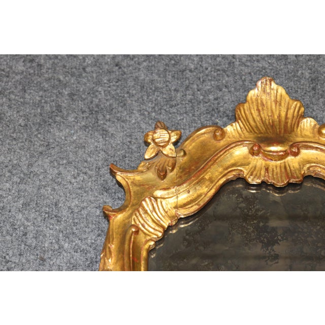 Early 20th Century Pair of Rare Tall Italian Rococo Style Distressed Carved Gilt Gold Mirrors For Sale - Image 5 of 10