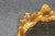 Early 20th Century Pair of Rare Tall Italian Rococo Style Distressed Carved Gilt Gold Mirrors For Sale - Image 5 of 10
