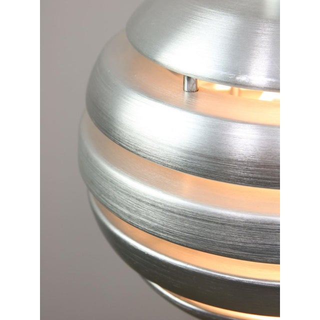 Total height of the lamp is adjustable, length of the cable alone is 140cm and can be shortened to your preference. Takes...