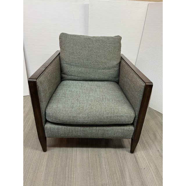 Design Plus Gallery presents a Club Armchair from Jason Furniture. The chair has a blue/green tweed upholstery with...