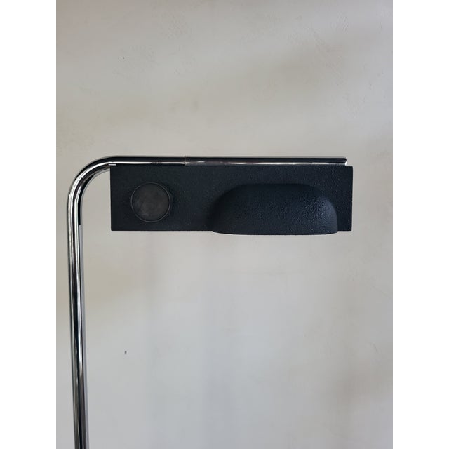 Camera Terra floor lamp by Ernesto Gismondi for Artemide. Height adjustable and 180 degree swivel head. This piece has an...