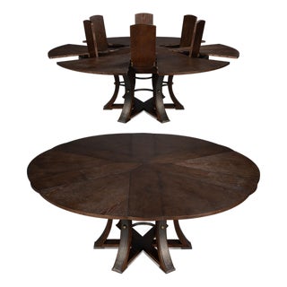 Round Jupe Dining Table With Self-Storing Leaves for Seating Up to 12 People For Sale