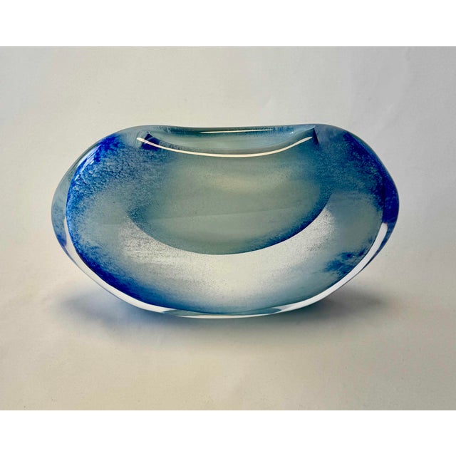 Blown and hand-formed glass object "Winter" is part of the four seasons series. The inspiration is based on the harsh...