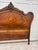 Antique (1890's) Full Size Headboard has a French Style. Carved & Shaped in a Brown Finish. The Wood is Walnut. This...