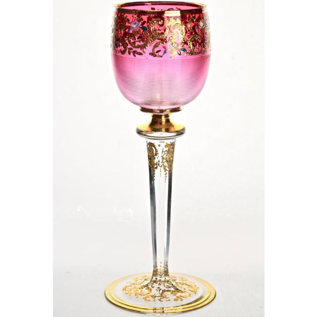 Set of six hand blown crystal goblets, having pink on colorless cased cups, embellished with threaded detail on gradation...