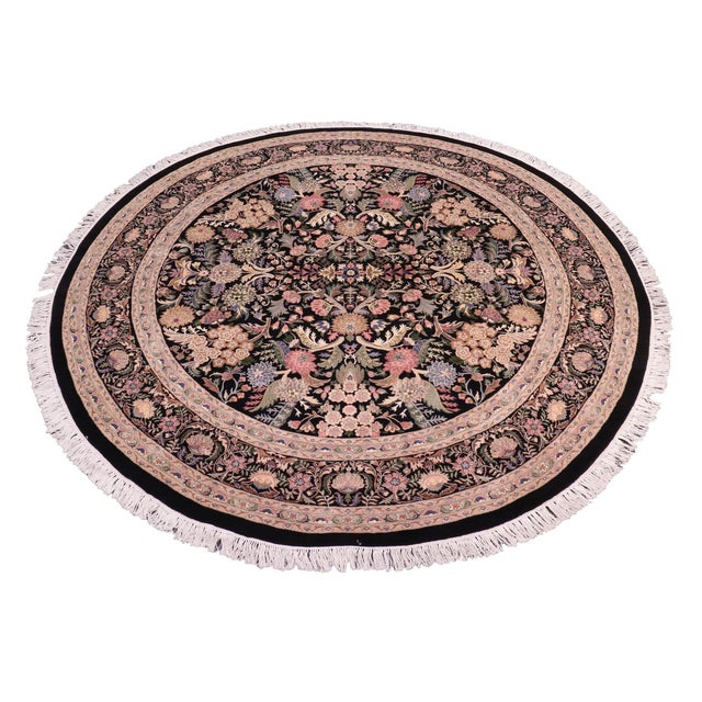 This hand‑knotted Pak Persian round rug showcases the finest expression of traditional Persian artistry. Each piece is...