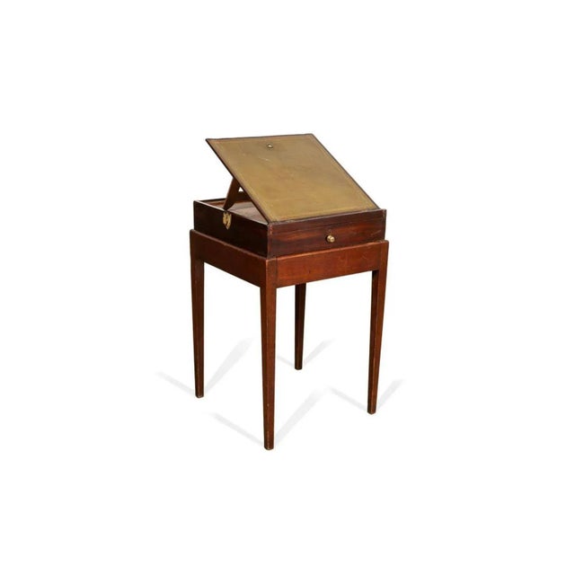 English George III mahogany architect's/drafting desk or writing table, 18th century, having an adjustable gold tooled...