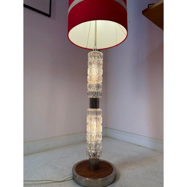 A spectacular lighting fixture: This Space Age floor lamp by Fischer Leuchten combines gleaming chrome, red fabric, and a...