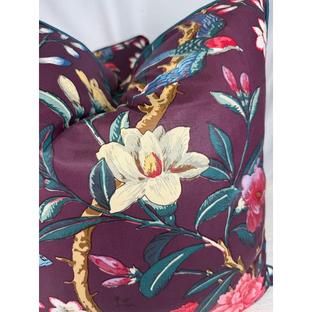 Custom pair of 22" pillows covered in a vintage Manuel Canovas floral chintz in a plum. These pillows are corded in Samuel...