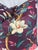 Custom pair of 22" pillows covered in a vintage Manuel Canovas floral chintz in a plum. These pillows are corded in Samuel...