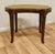 French Empire style Bergère kidney shaped stool. This is a charming French empire style walnut stool, the stool has a...