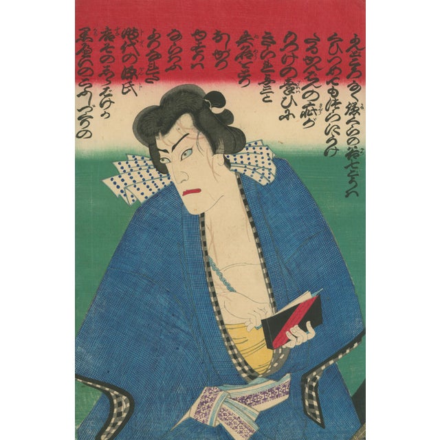 Original Japanese ukiyo-e color woodblock actor portrait (yakusha-e), depicting a kabuki performer in a blue robe holding...