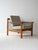 Original vintage armchair with oak structure and cushions lined with light bouclé fabric. It stands out for its typical...