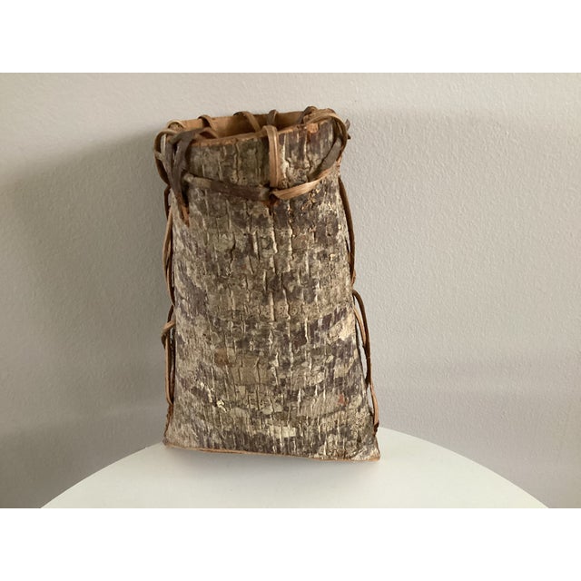 This handmade berry basket is made of bark in shades of gray, beige and brown. Contrasting brown bark is used in the...