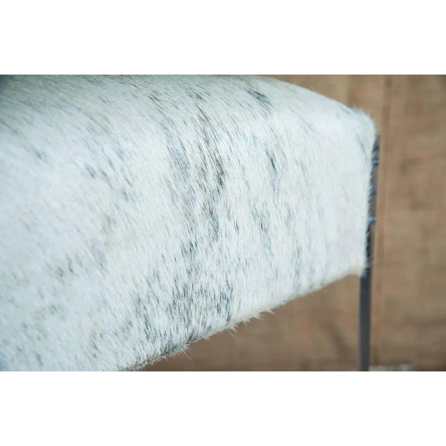 Maurice Lucite bar stool. Add style and a touch of Hollywood glam to your decor. Modern acrylic frame fastens to cowhide...