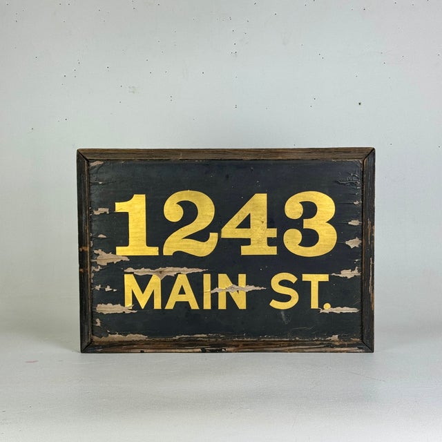 It's gorgeous in its simplicity and BOLD in its impact. A straightforward house number plaque sign with golden gilt...