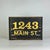 It's gorgeous in its simplicity and BOLD in its impact. A straightforward house number plaque sign with golden gilt...