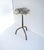 A contemporary drinks table featuring an organically shaped agate top with natural banding and translucent depth. The...