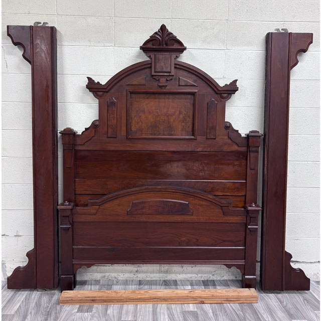 This is a stunning full size antique Monumental Victorian Renaissance Revival walnut and burl wood bed, circa 1880s,...