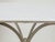 An Italian steel table from the mid 20th century, with white marble top and tripod base. Created in Italy during the...