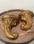 Mid 20th century Italian gilt wood shelf brackets with a lovely curled scroll. Made in Italy in the Florentia Style. These...