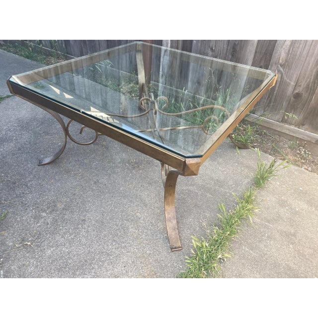 Vintage Mid Century Modern glass and metal bronze coated coffee table some scuffs and marks in good vintage condition.