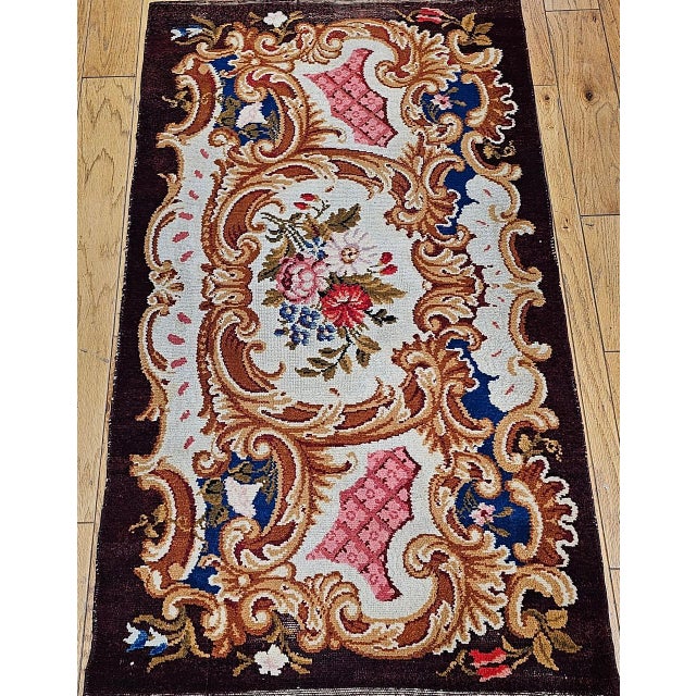 An exquisite antique French Savonnerie hand-knotted area rug from the late 19th century, crafted in the grand royal...