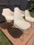 Elevate your dining space with this stunning set of four vintage Burke fiberglass chairs. Proudly manufactured by Burke,...