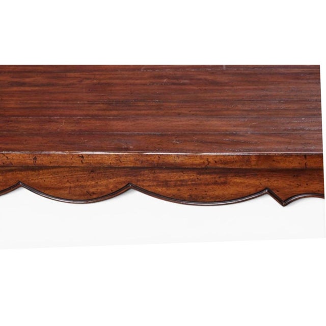 18th C Style Minton Spidell French Country walnut dining table. It showcases characteristic Louis XV styling, featuring an...