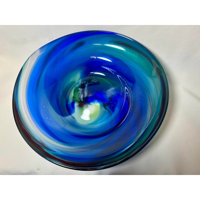 Large-scale hand-blown art glass centerpiece bowl by renowned California artist Caleb Siemon. This piece is part of...