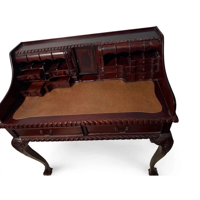 Exquisite antique Chippendale-style mahogany secretary writing desk, circa early 20th century. This stunning Carlton House...